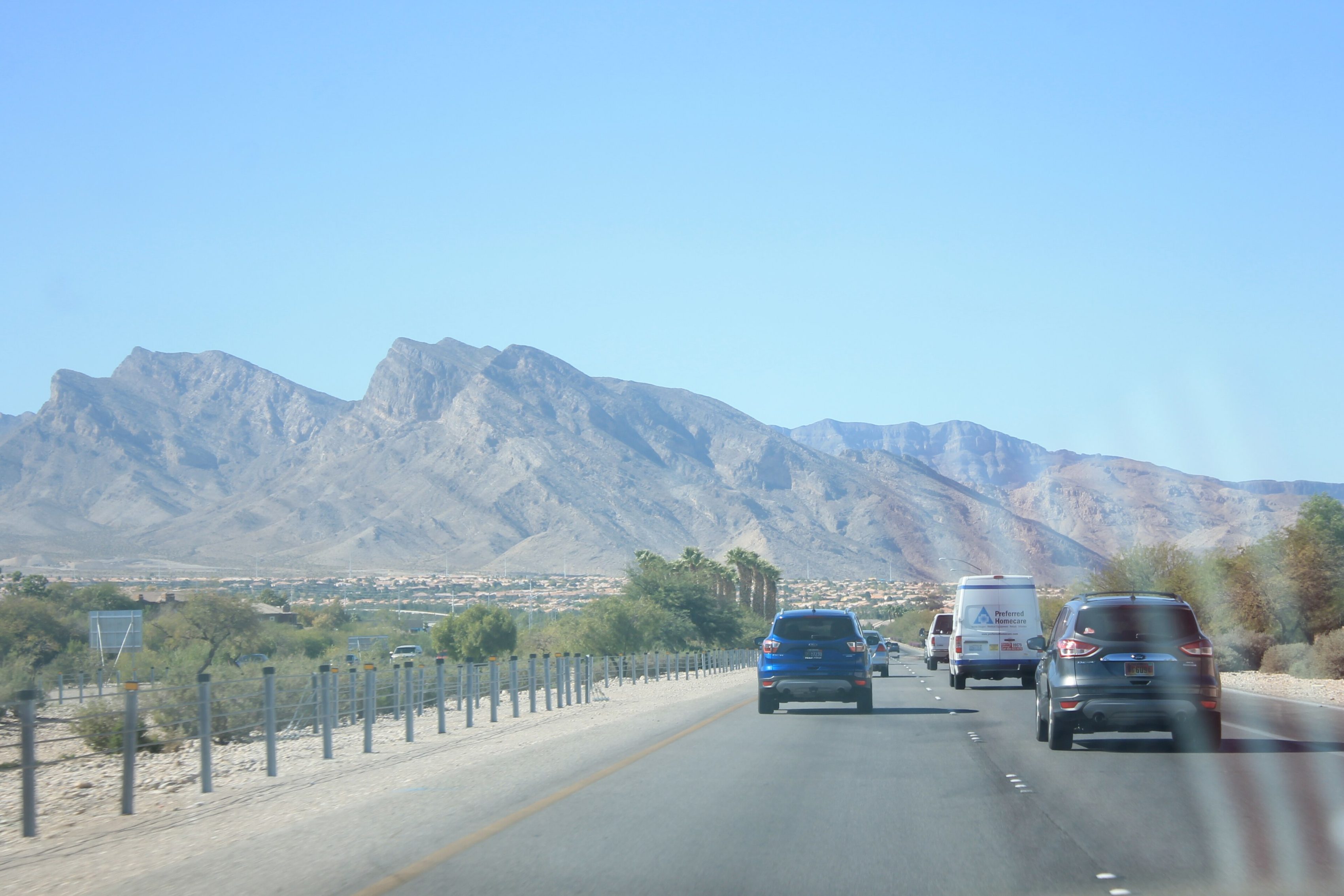 The Red Rock escarpment seen from the road above Summerlin.