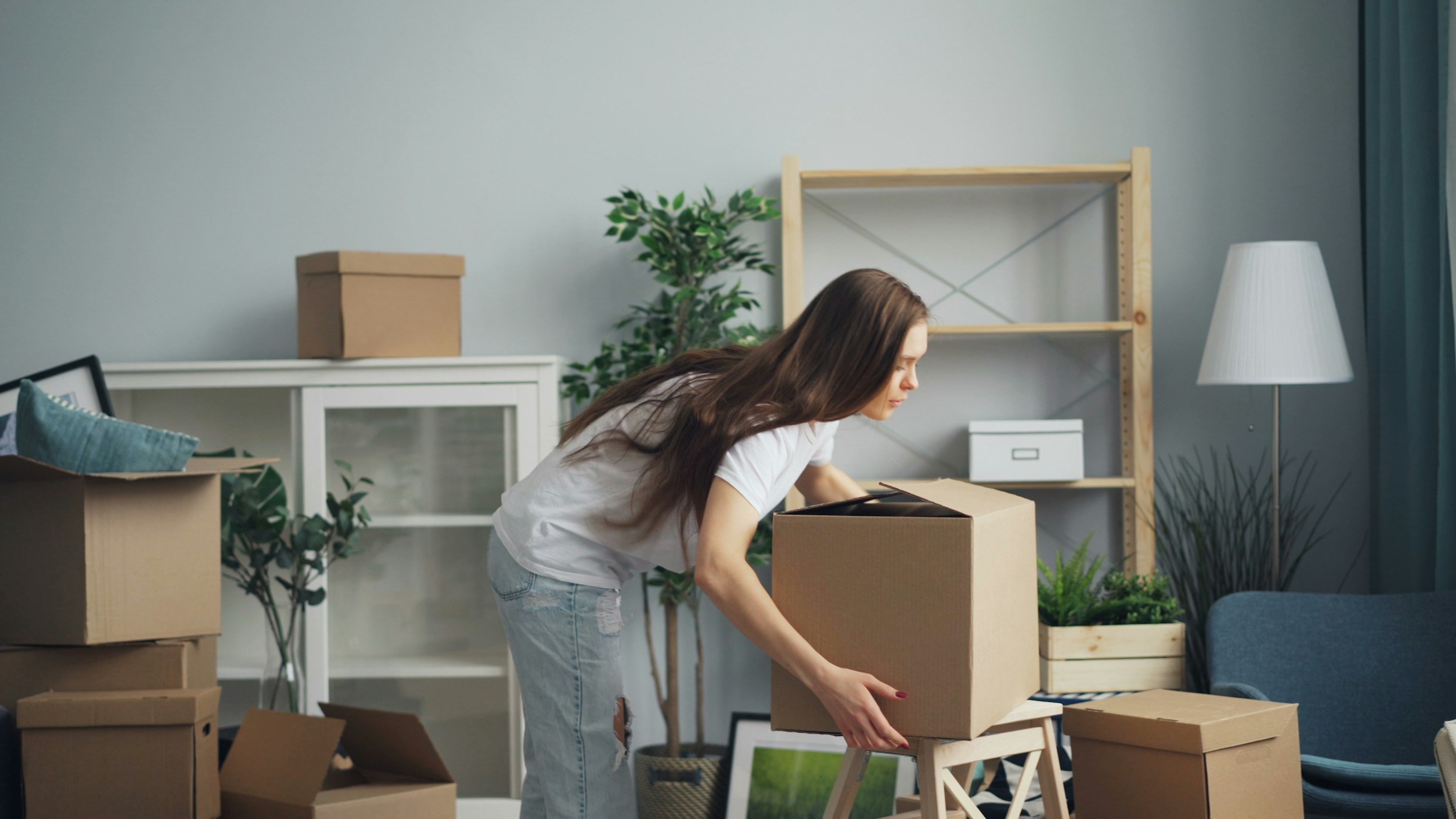 A customer preparing boxes for a residential move