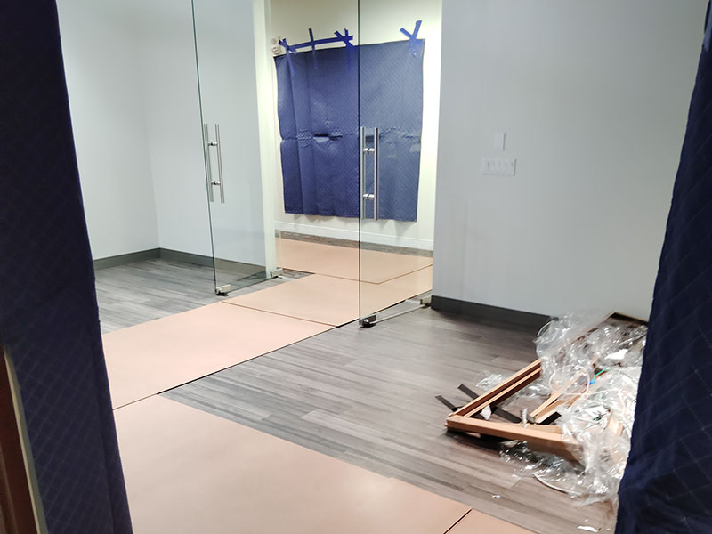 Retail fixtures and furniture staged for installation.